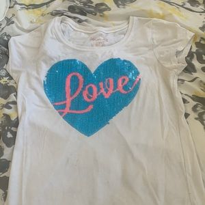 I’m selling a white T-shirt for kids 13-16 Made with Cotten, And made from china